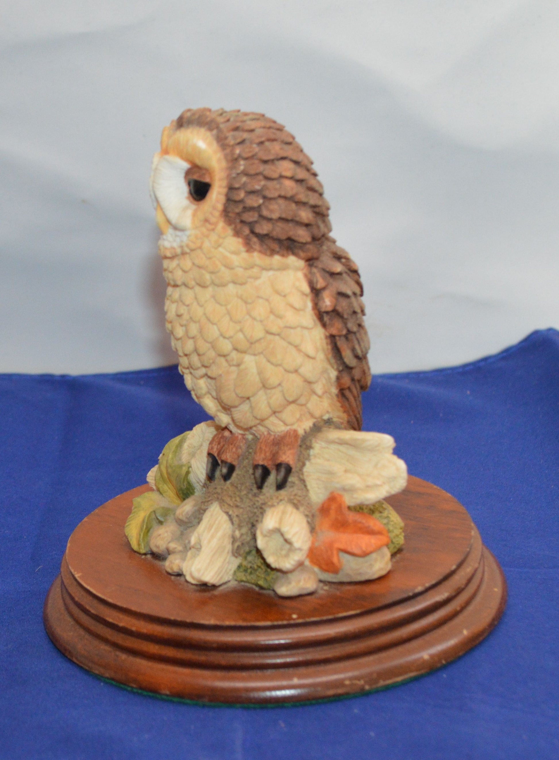 Side view of a detailed owl figurine