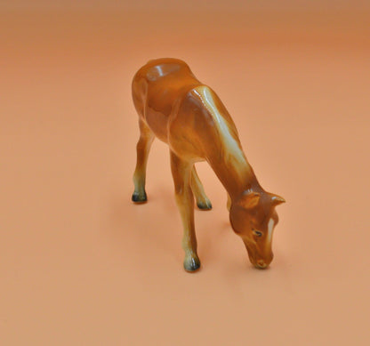 TAN HORSE FIGURINE - TMD167207